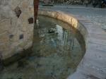Particolare della fontana della piazza di Sant'Agostino da notare la pietra il materiale usato per la costruzione.