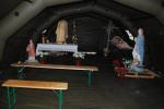 L'interno della tenda pneumatica allestita a chiesa nel campo di accoglienza della popolazione della Regione Toscana