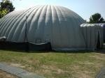 La grande tenda pneum,atica ad uso ludoteca allestita all'interno del Campo di San Possidonio (MO)